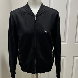 Burberry sweatsuit. Black zip jacket with matching pants. Sz S.